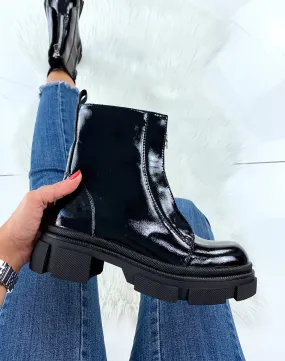 Bottines hautes vernies noires à détail argenté